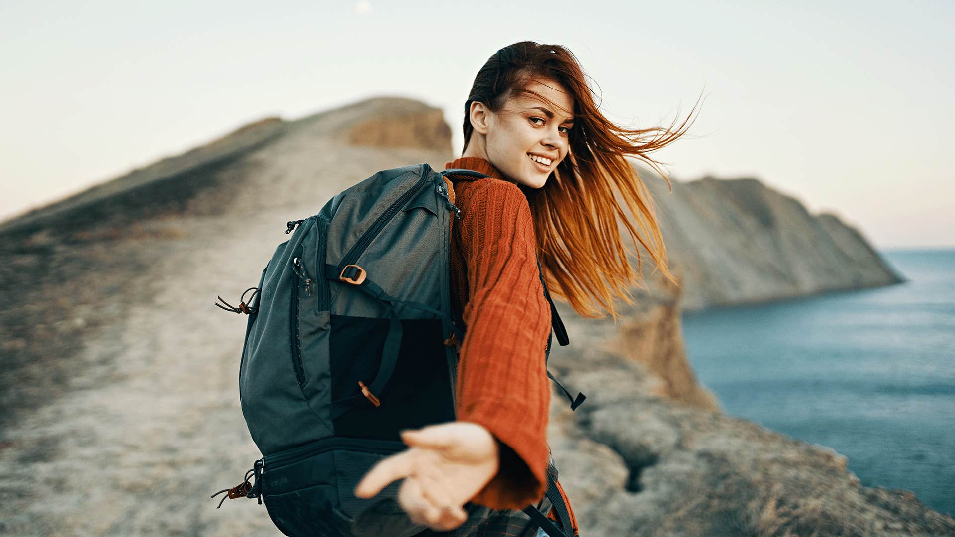 happy woman taking a selfie outdoors