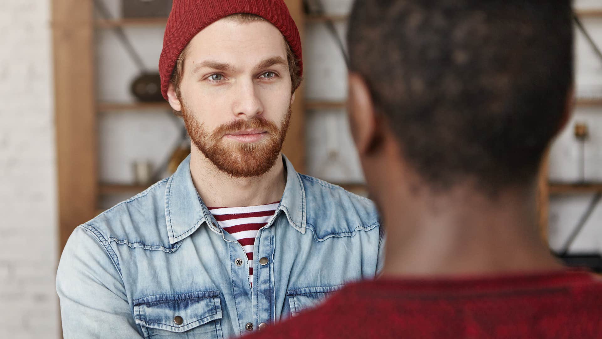 man cutting off toxic friendship
