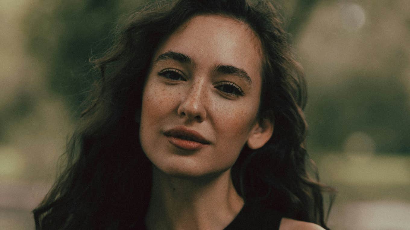 Secret Laws Of Attraction That Make Someone Irresistible, According To Psychology Woman is irresistible.