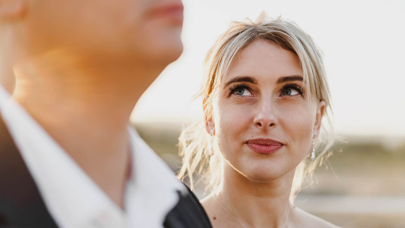 HowTo Make Someone Think About You Nonstop Portrait of a woman looking at a man in a sunset light