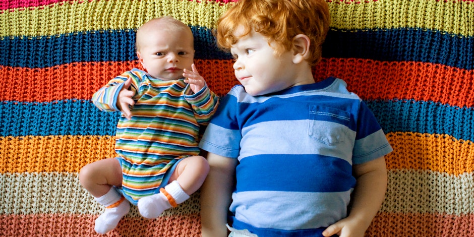 The Devastating Reason I'm Forced To Hide My Son's Autism Diagnosis two brothers laying on carpet together