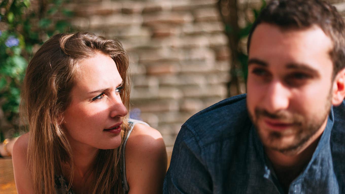 20 Good Questions To Ask A Guy To Really Get To Know Him Young Couple talking to each other on a sunny day