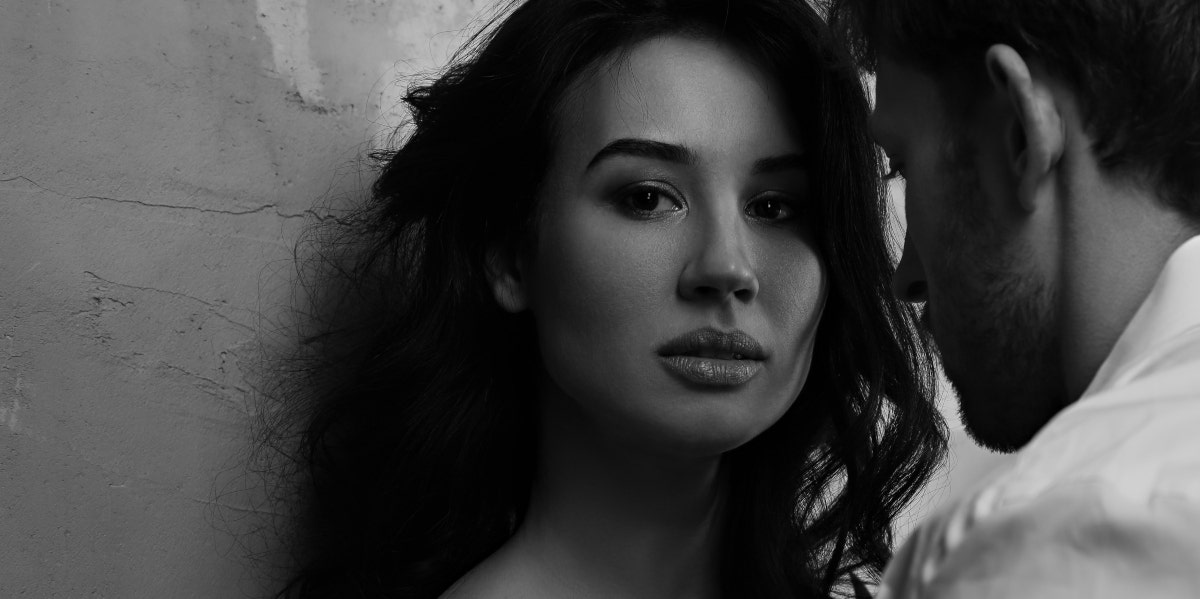7 Signs A Guy Doesn't See A Future With You black and white moody photo of a couple