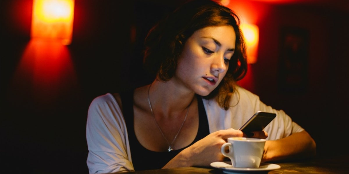 7 Early Signs Of A Controlling Boyfriend Who Thinks He Owns You sad woman on her phone