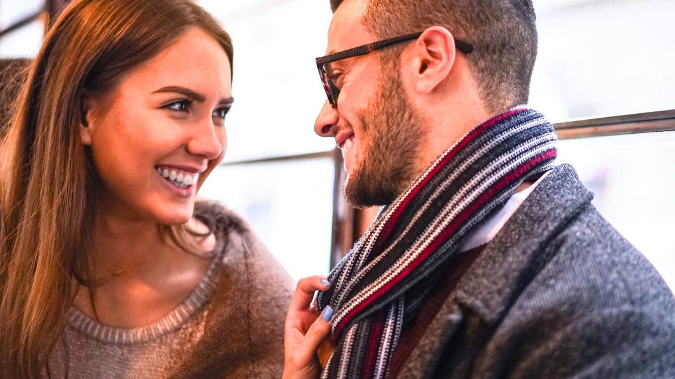 Weird Things Men Want In A Woman, According To Research man and woman looking at each other
